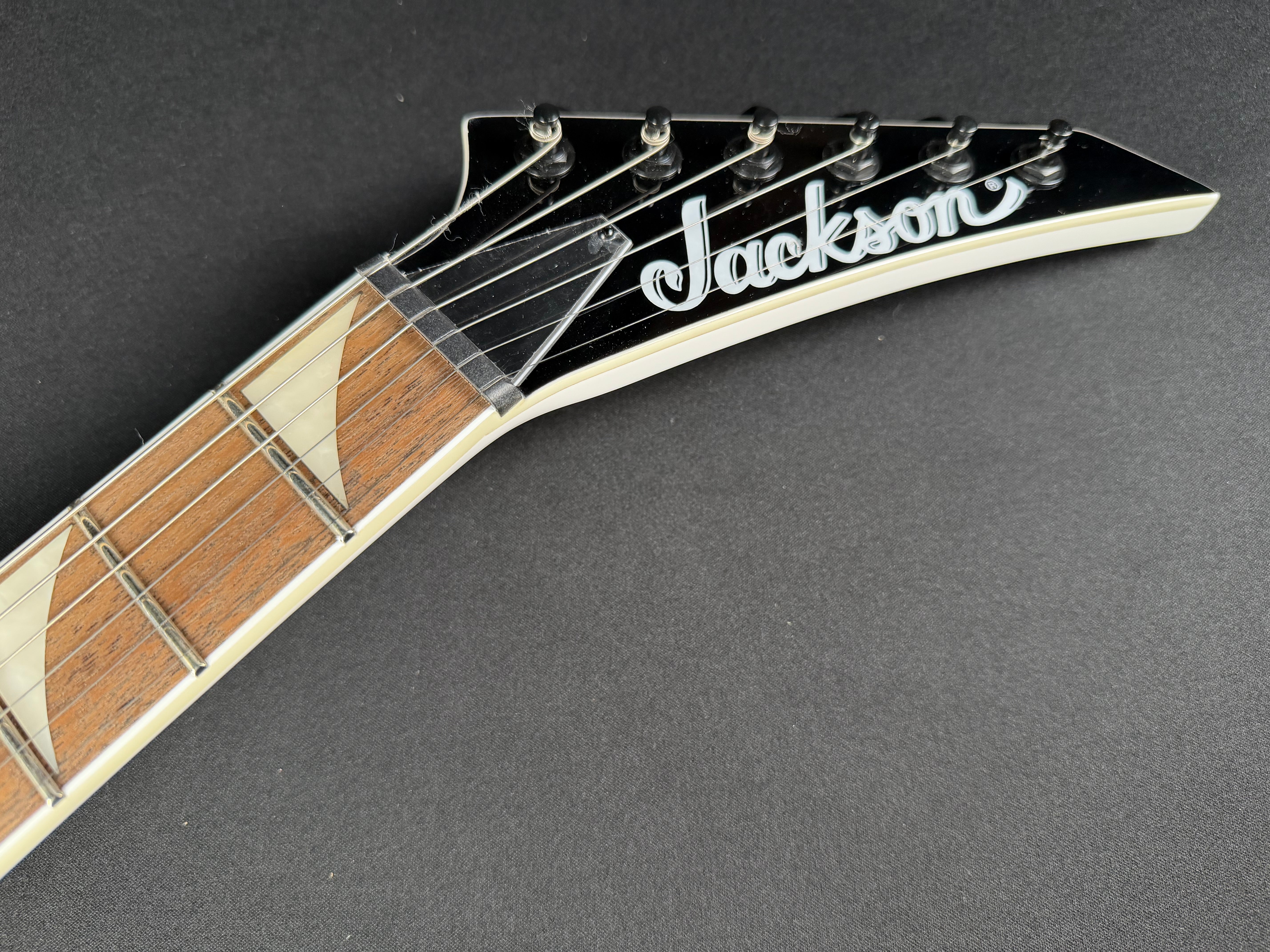 Jackson X Series Soloist SLX DX HT - Snow White - Metronome Music Inc.