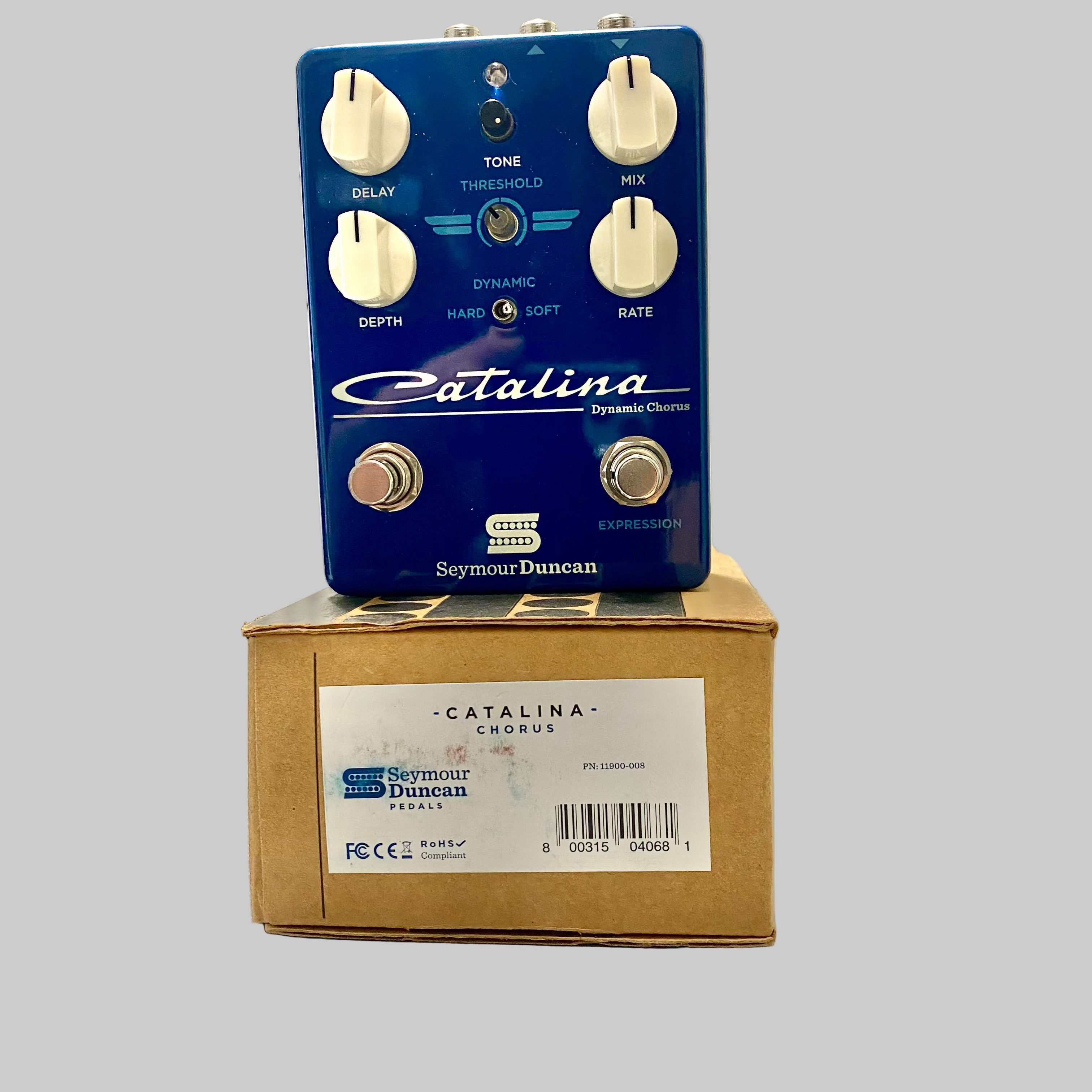 Seymour Duncan Catalina Dynamic Chorus pedal on top of its box with a neutral background.