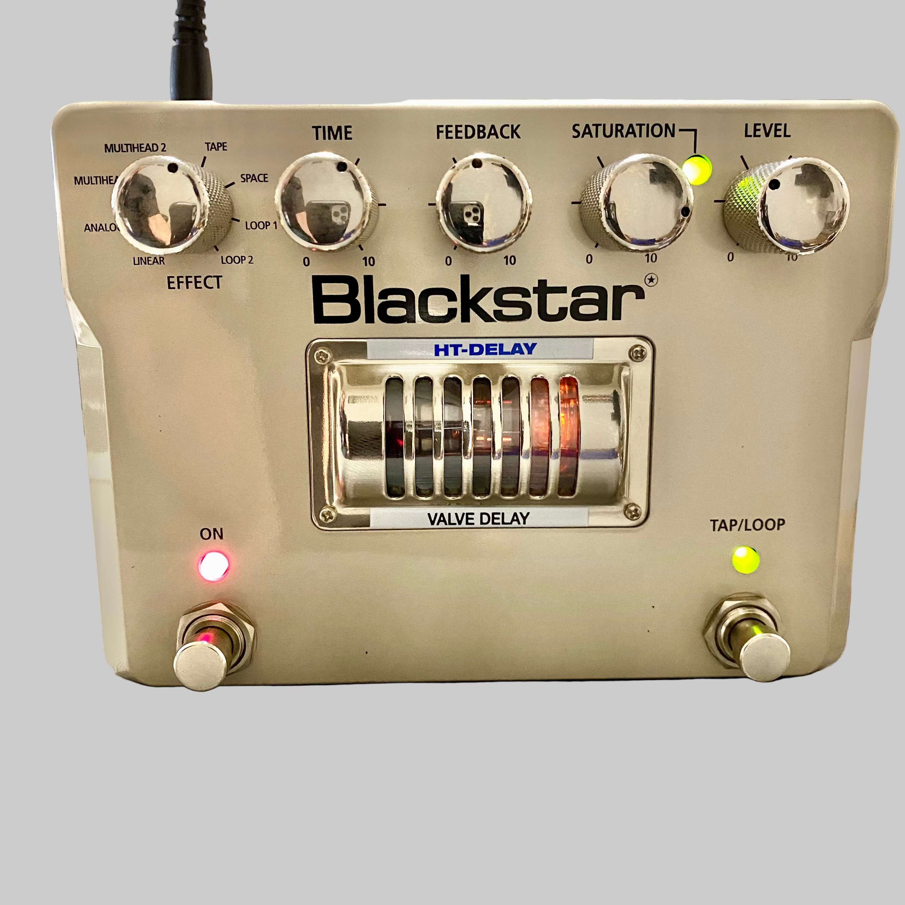 Blackstar HT-Delay guitar effects pedal on a wooden surface