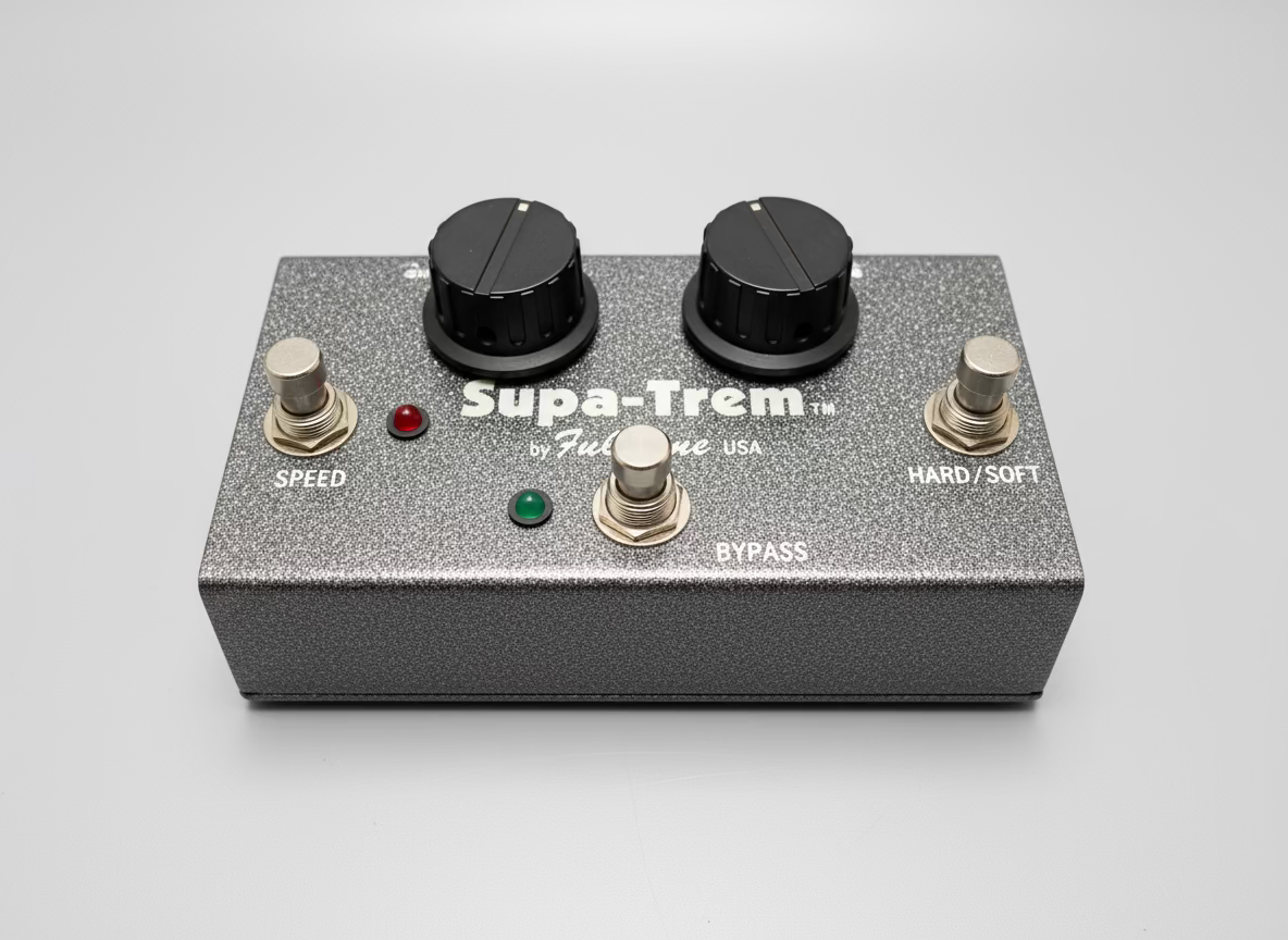 Supa-Trem guitar effects pedal on a wooden surface