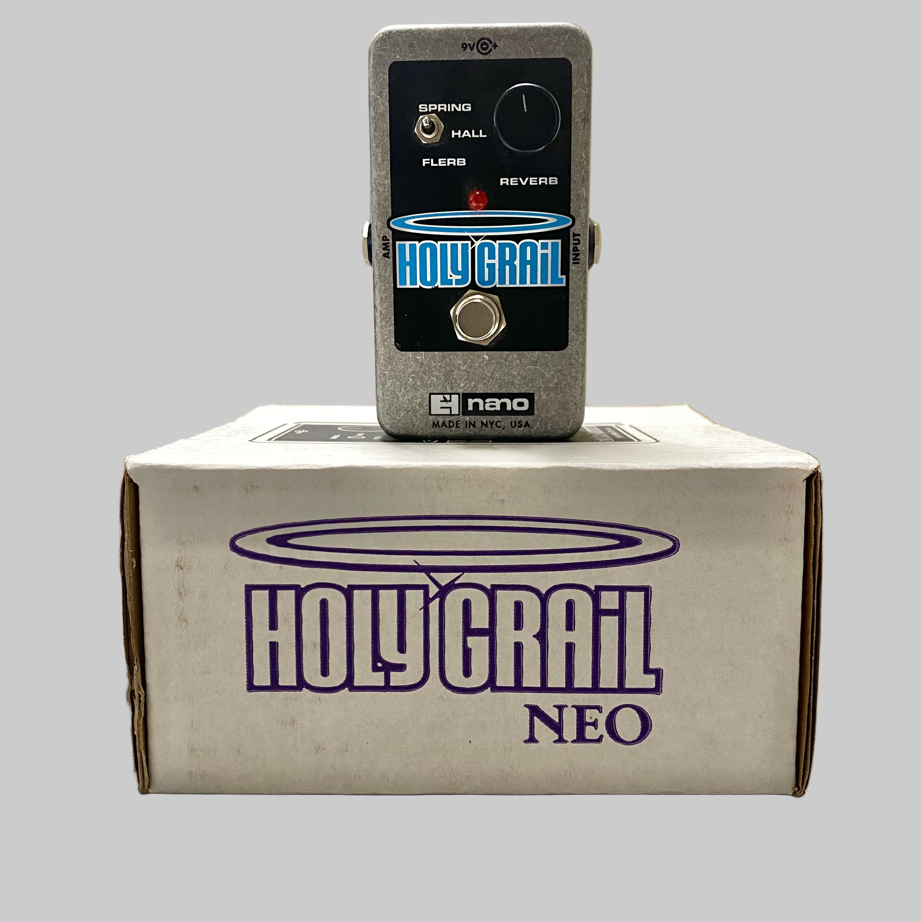 Hono Holy Grail Neo guitar effects pedal on top of its packaging box.