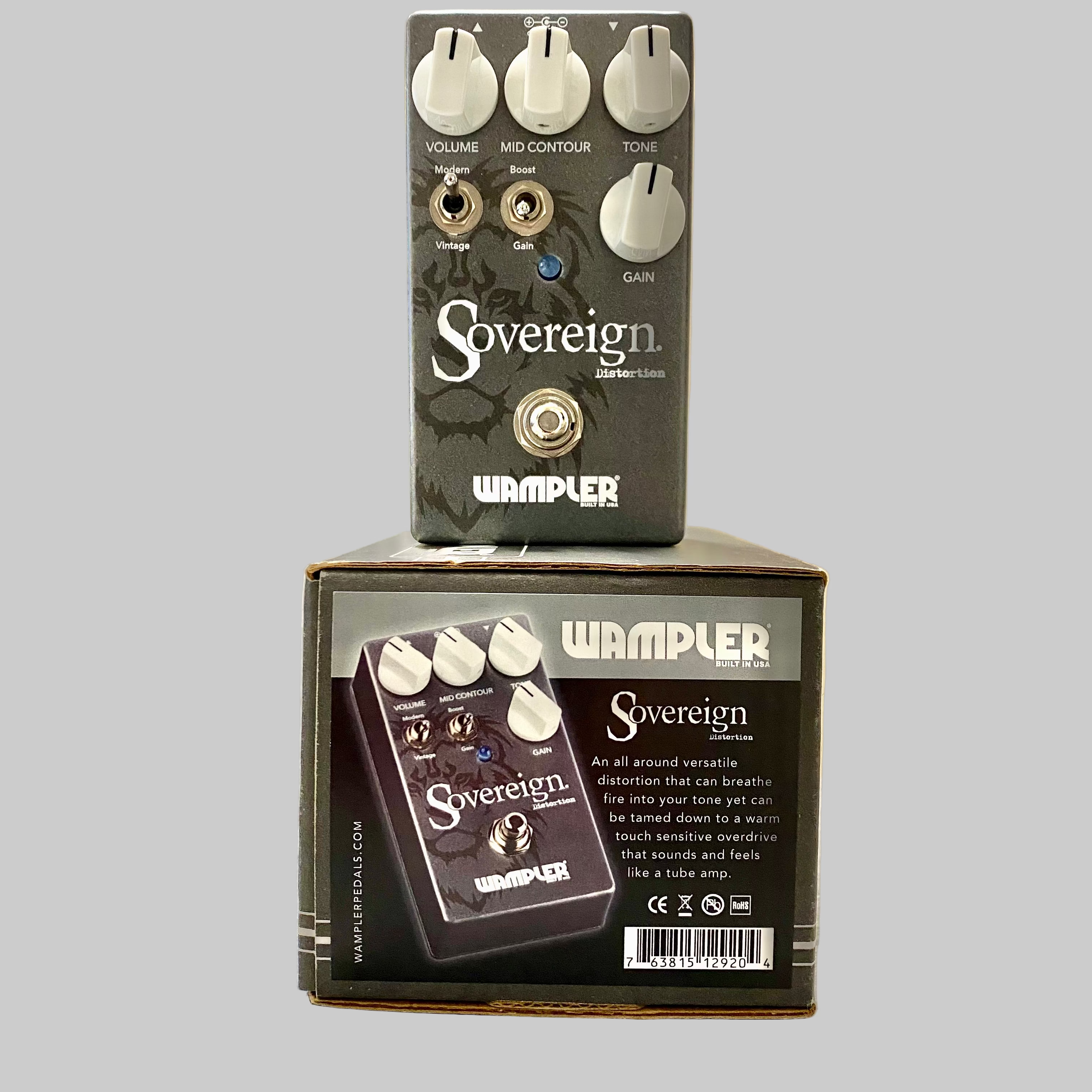 Wampler Sovereign guitar effects pedal on top of its packaging box in a room setting.