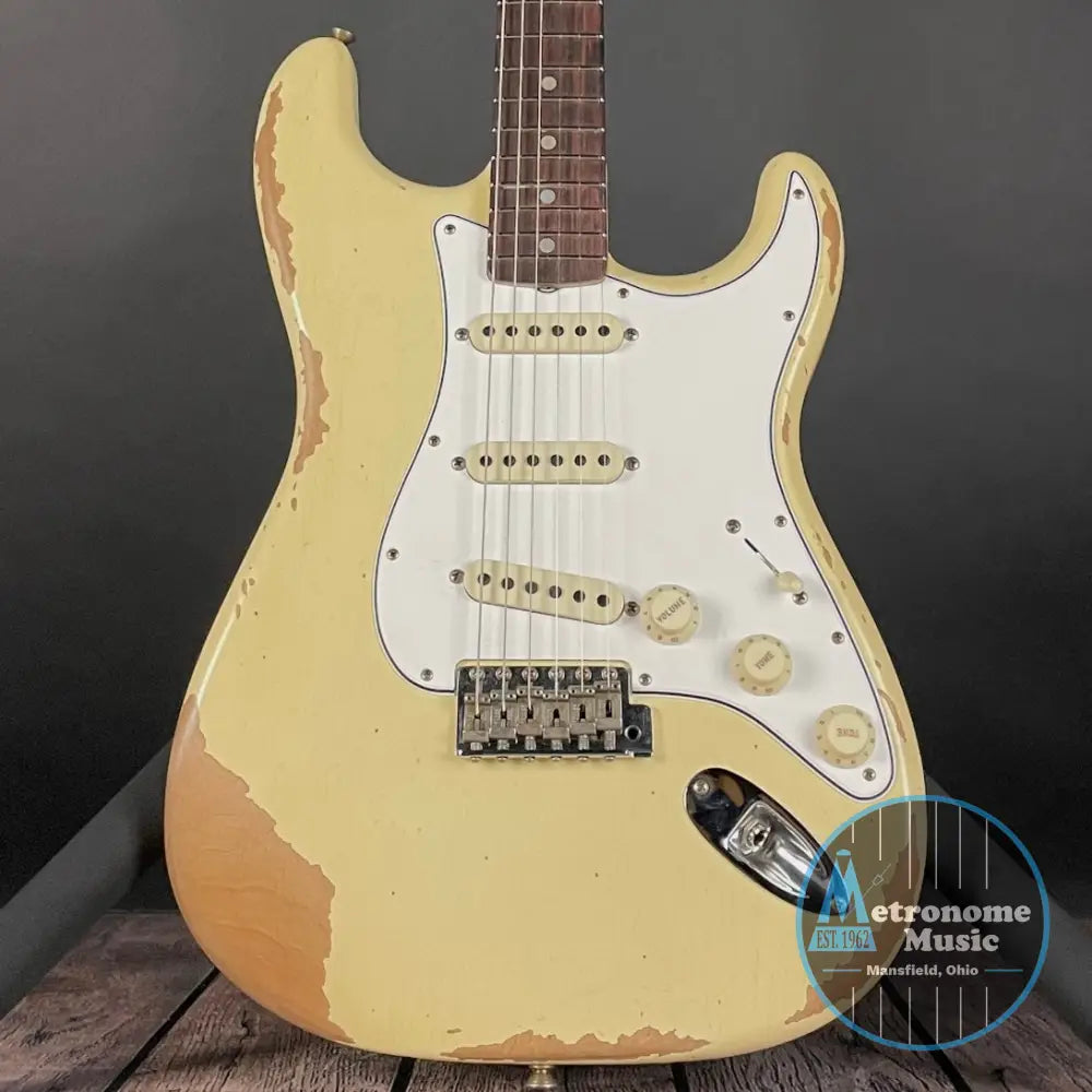 Fender Custom Shop 1967 Stratocaster, Heavy Relic- Aged Vintage White (8lbs 1oz) - Metronome Music Inc.